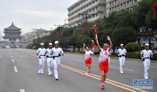 十四運(yùn)會(huì)和殘?zhí)貖W會(huì)火炬正式在陜西傳遞